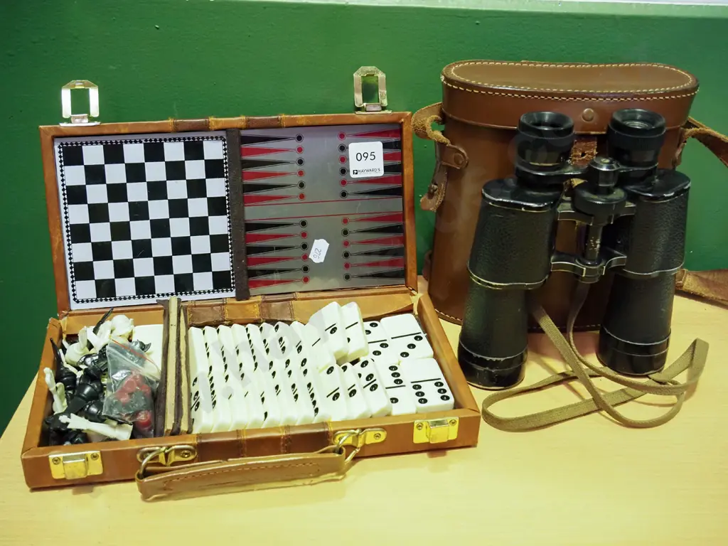 games compendium, pair of leather cased binoculars Image 1++