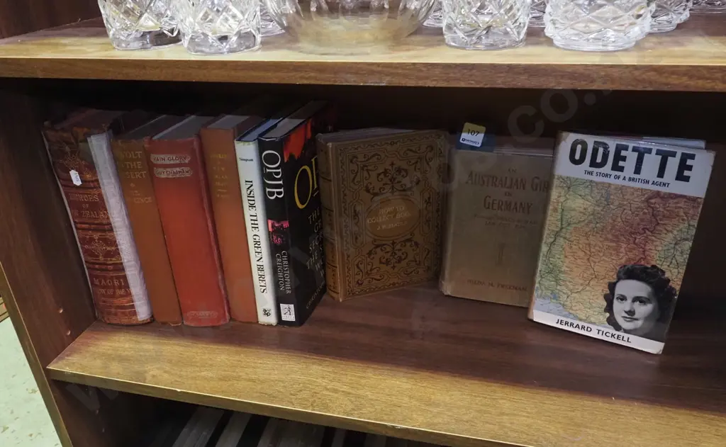 shelf of books about war Image 1++