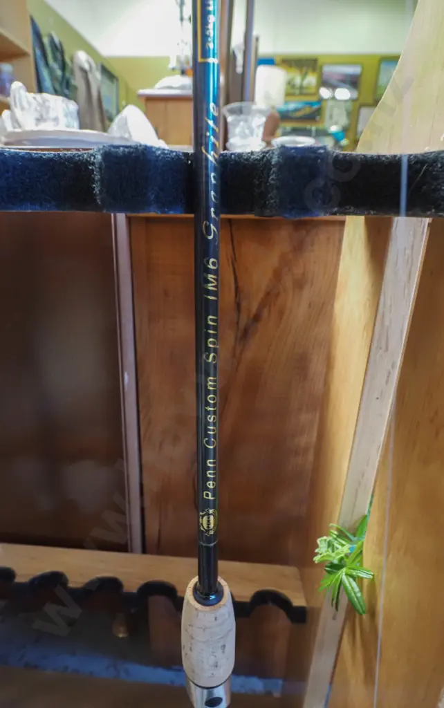 2x fishing rods and reels - green dots Image 1++