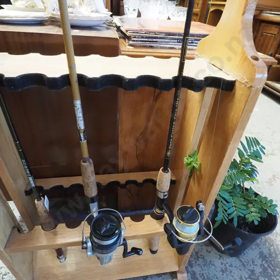 2x fishing rods and reels - green dots