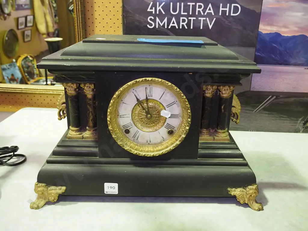 restorer's wood cased black  and gilt painted mantle clock Image 1++