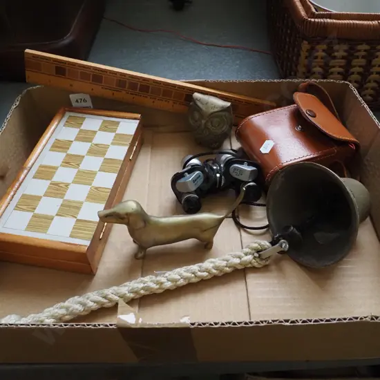box; brass bell, binoculars, chess etc
