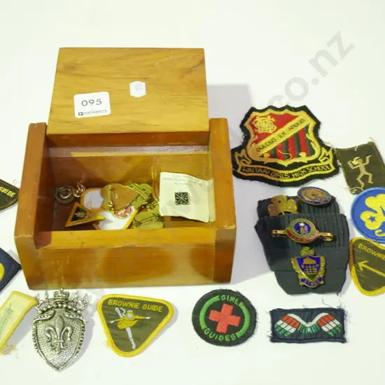 wooden trinket box with various Girl Guides, Brownies and other badges
