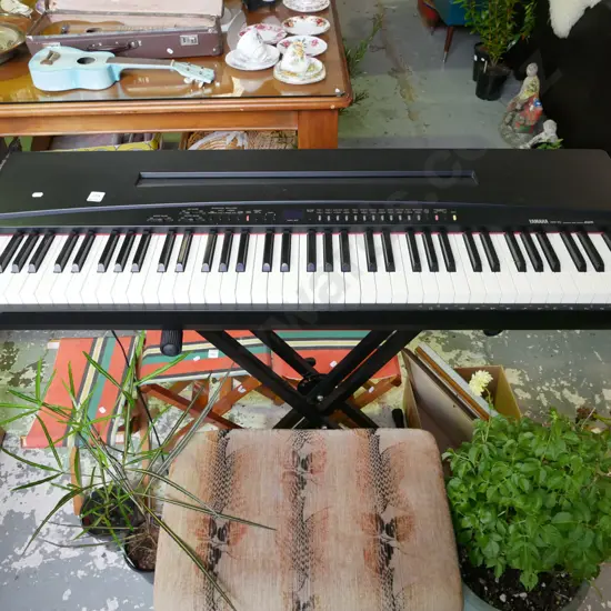 Yamaha YFP-70 keyboard on stand - may need attention, sustain seems to be stuck on