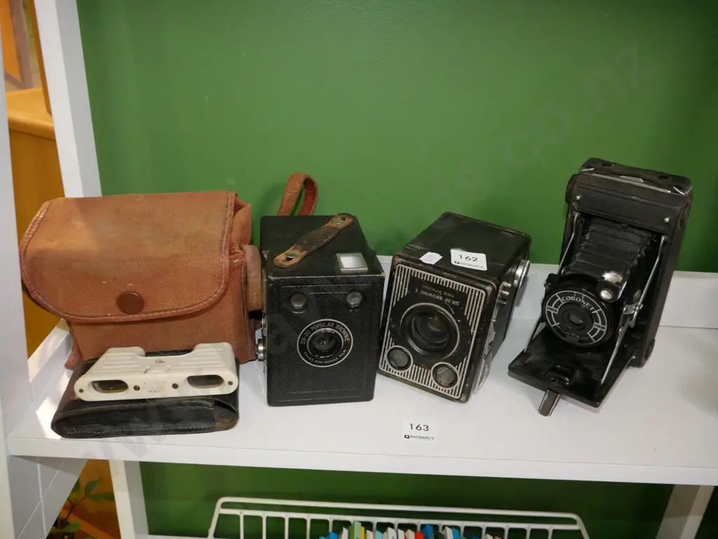 boxed Brownies, opera glasses, concertina camera Image 1++