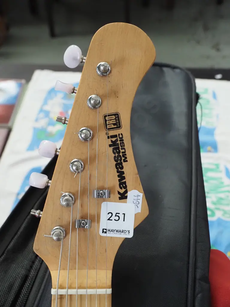 Kawasaki small (3/4 size?) electric guitar - missing 2 tuning knobs Image 1++