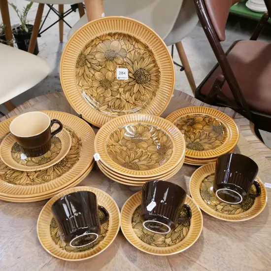 Crown Lynn honey glow dinner items; plates, bowls, cups etc