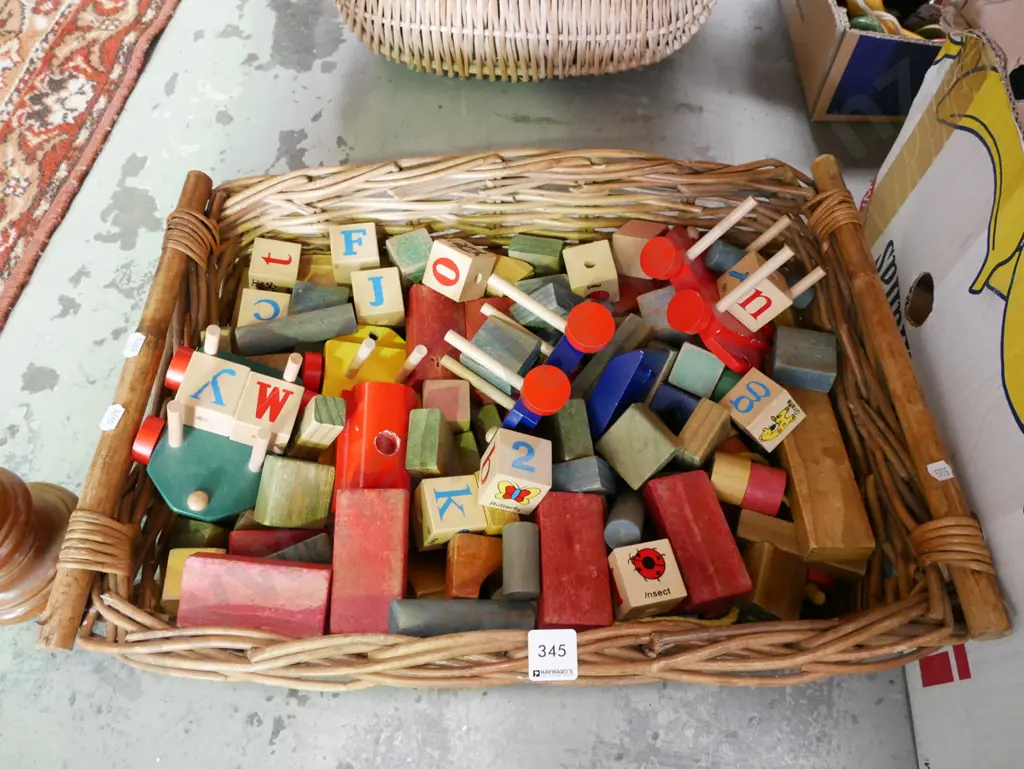 cane basket of wooden blocks  Image 1++