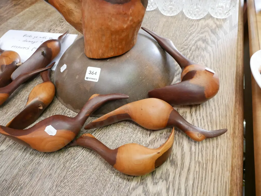 restorer's wooden bird sculpture Image 1++