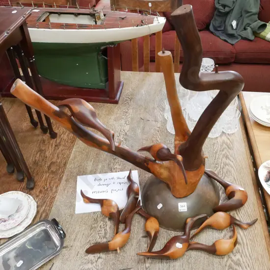 restorer's wooden bird sculpture