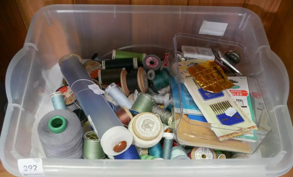 container of threads and sewing accessories Image 1++