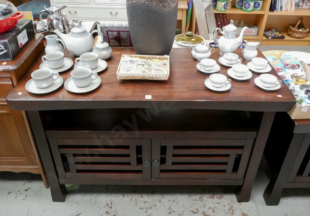 dark stained wooden sideboard w/ 2 doors and metal drop leaf handles H-770 W-1260 D-535 Image 1++