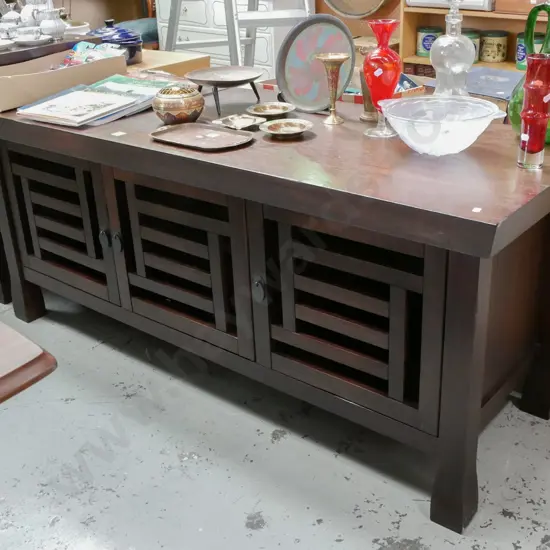 dark stained timber low sideboard with 3 doors and metal drop leaf handles H-660 W-1580 D-560