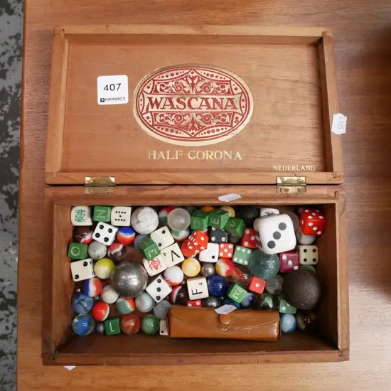 cigar box with dice and marbles