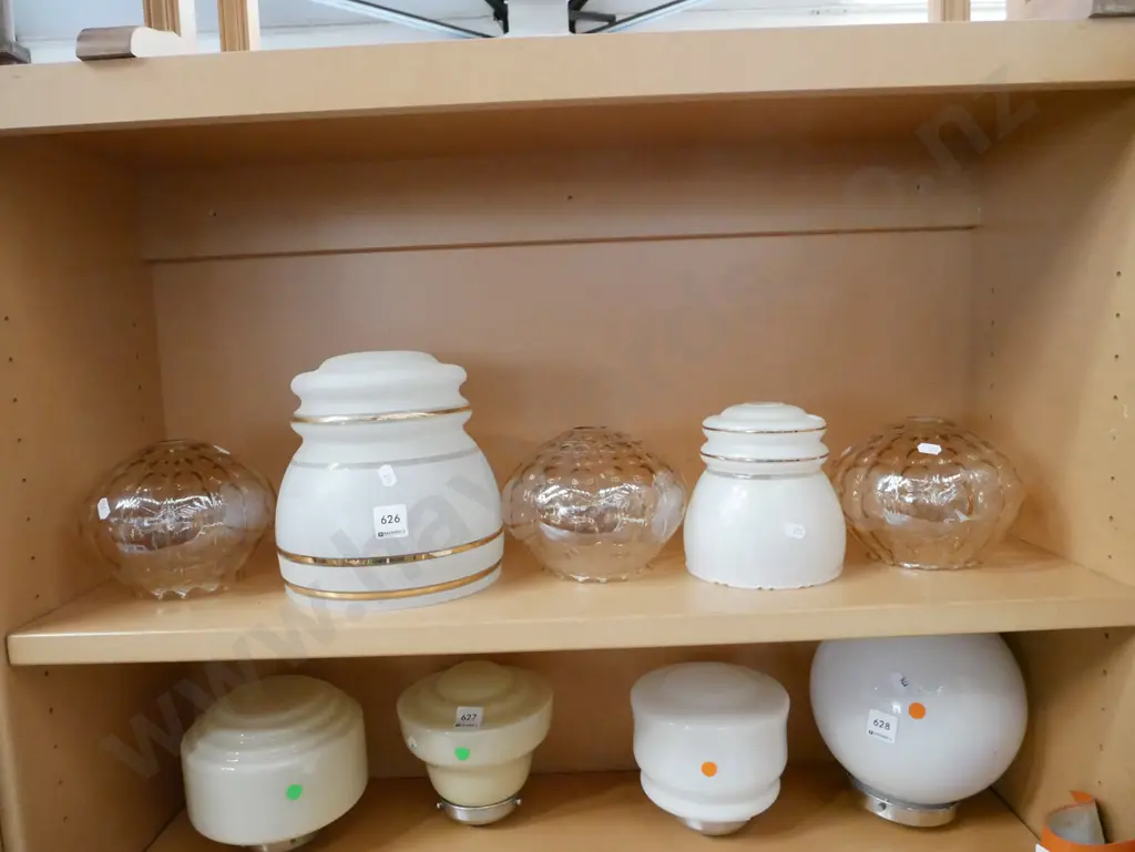 shelf of amber glass and other light shades Image 1++