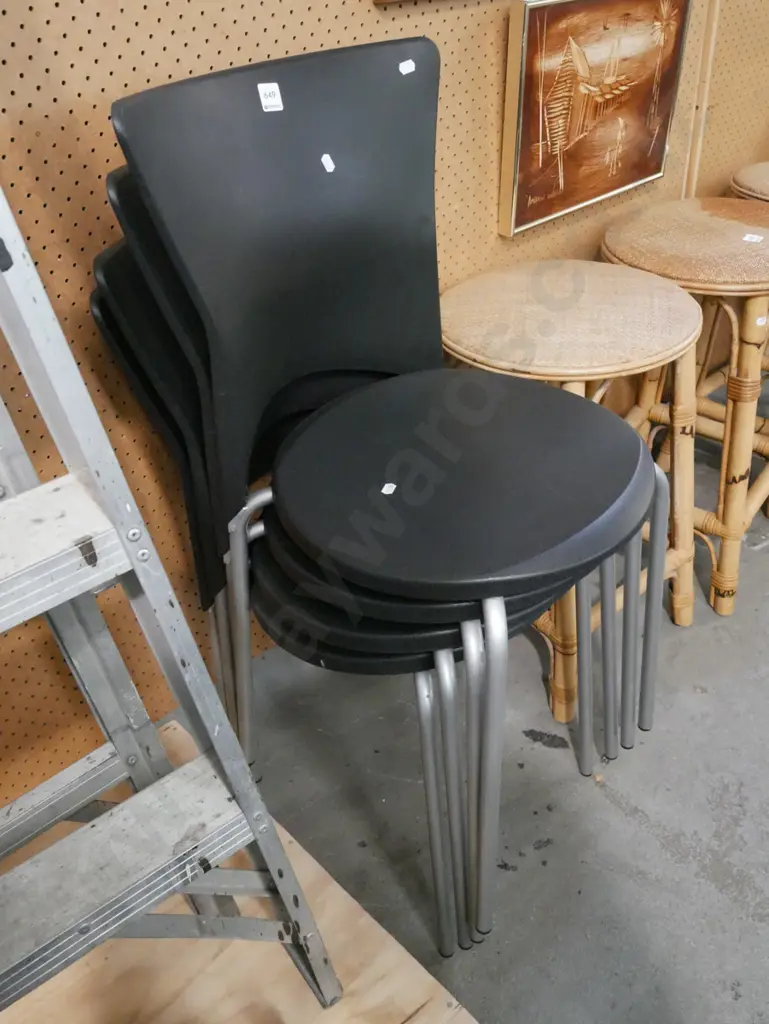 4x black plastic and metal stacker chairs Image 1++