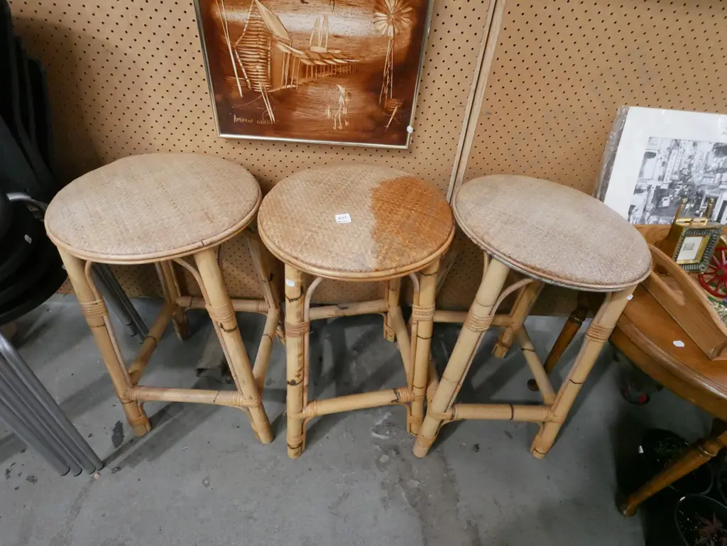 3x bamboo and woven cane stools - 1 has staining Image 1++