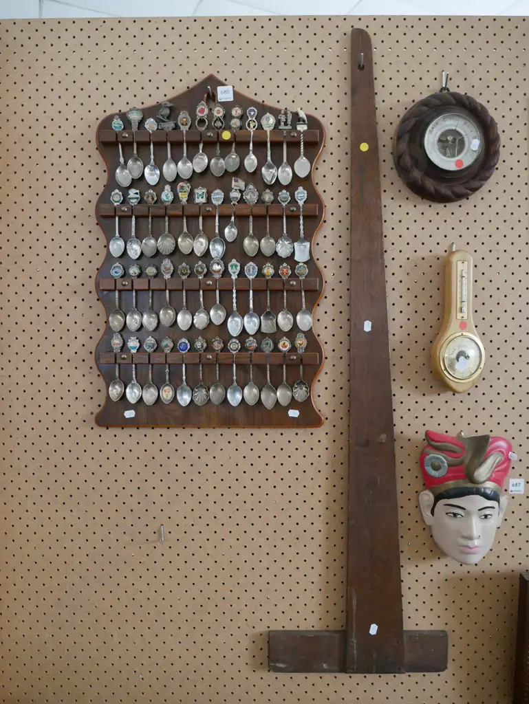 souvenir teaspoons in rack, draughting square - yellow dots Image 1++