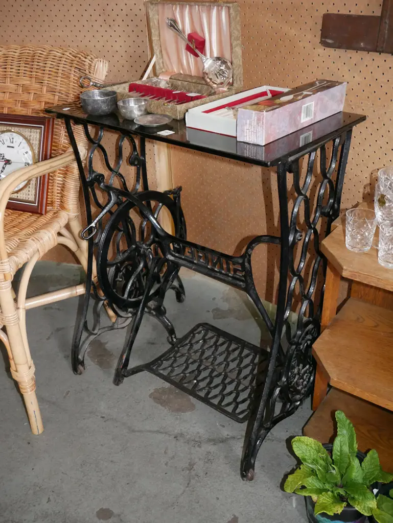 hall table made out of Singer treadle sewing machine base with smoked glass top Image 1++