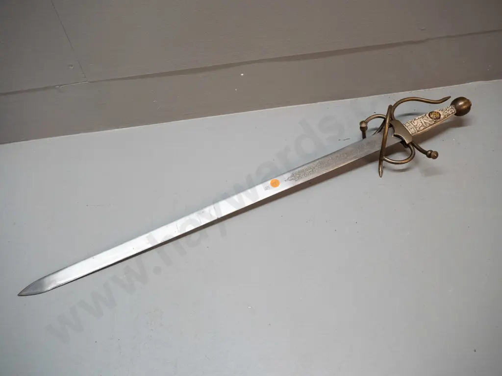 reproduction short sword with faux bone composite handle, brass fittings, etched blade marked Toledo Spain. L-720 Image 1++