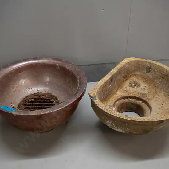 2 salt glazed storm drain traps, round one marked JH Lambert Dunedin, has rusted metal grate, no maker's marks on other