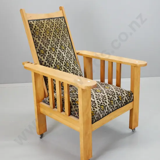 vintage rimu Morris chair w/brass back support bar, slat sides, velvet upholstery, on metal casters - some wear to
