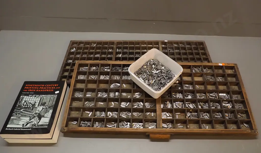 2 vintage printing type trays with large collection of lead type and 2-volume "Nineteenth Century Printing Practices" by Image 1++