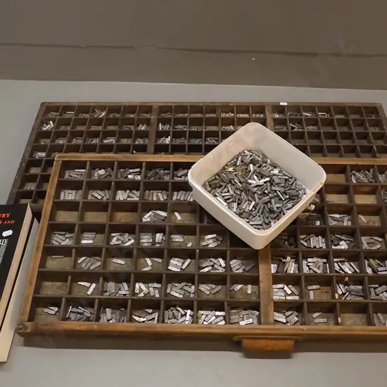 2 vintage printing type trays with large collection of lead type and 2-volume "Nineteenth Century Printing Practices" by