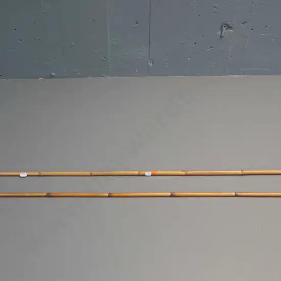 2 bamboo spears (from Solomon Islands) - one with 5 steel prongs, one with wooden barbed head L-1455