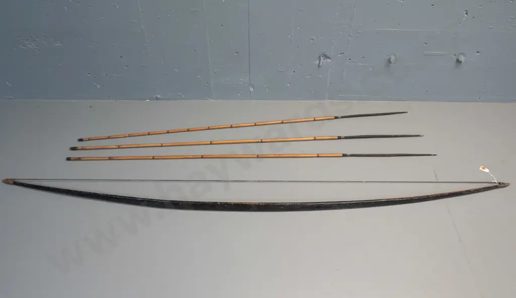 strung bow and 3 bamboo arrows - Dani tribe, West Papua - with timber heads attached with binding  some age wear. Image 1++