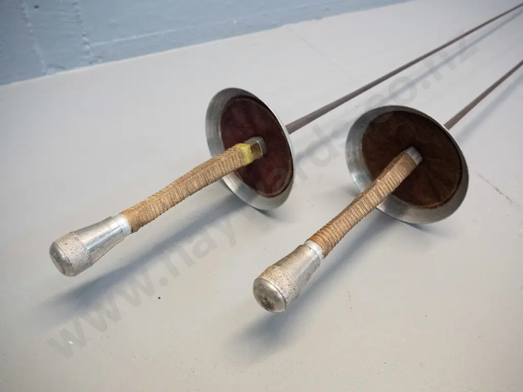 pair of vintage fencing foils with waxed cord wound handles, leather inset in hilt - made in France. One handle has been Image 1++