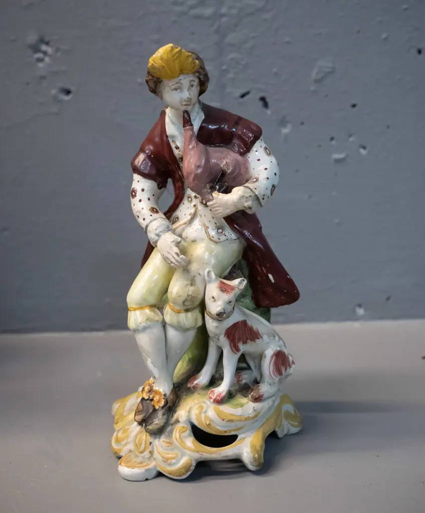 small figurine of man playing bagpipes - has been marked on base "Chelsea Derby circa 1785" - some damage to pipes H-160 Image 1++