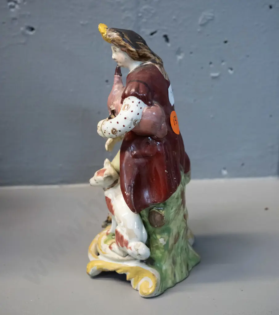 small figurine of man playing bagpipes - has been marked on base "Chelsea Derby circa 1785" - some damage to pipes H-160 Image 1++