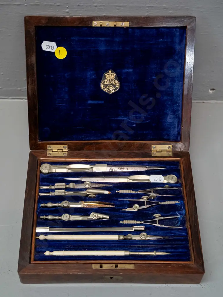 vintage cased drafting / mathematical instrument set, some with ivory handles, case marked Troughton & Simms, Fleet St. Image 1++
