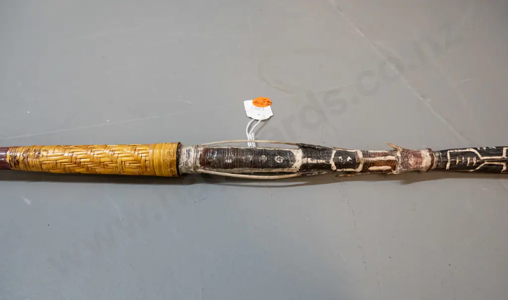 spear (Solomon Islands) with pronged timber head, carved motifs, shaft covered with woven cane - barbs made from bone? Image 1++