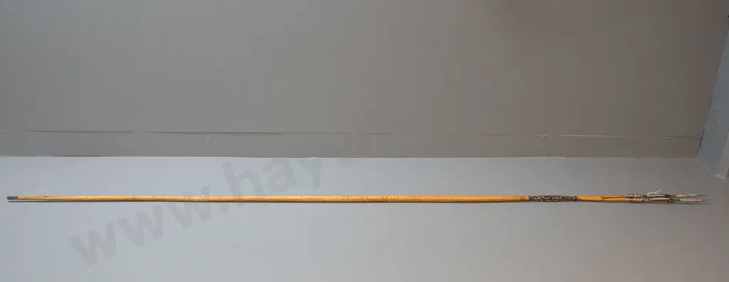 spear (Solomon Islands) with double pronged timber head, carved motifs, shaft covered with woven cane, barbs made from Image 1++