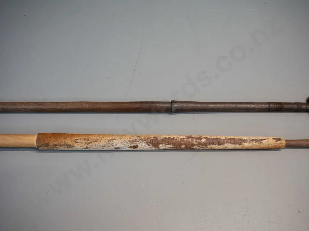 2 vintage spears with timber shafts and forged iron heads, one with skin grip and forged metal tail binding has broken Image 1++