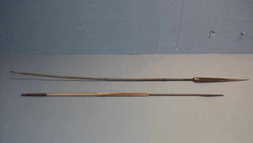 2 vintage spears with timber shafts and forged iron heads, one with skin grip and forged metal tail binding has broken Image 1++