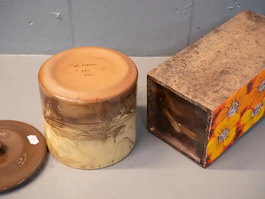 2 pieces of studio pottery - Te Rona lidded pot and a retro slab sided rough textured jug vase with one glazed floral Image 1++
