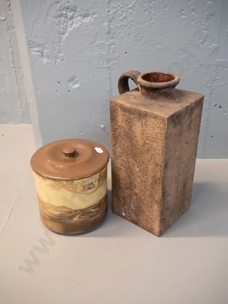 2 pieces of studio pottery - Te Rona lidded pot and a retro slab sided rough textured jug vase with one glazed floral Image 1++