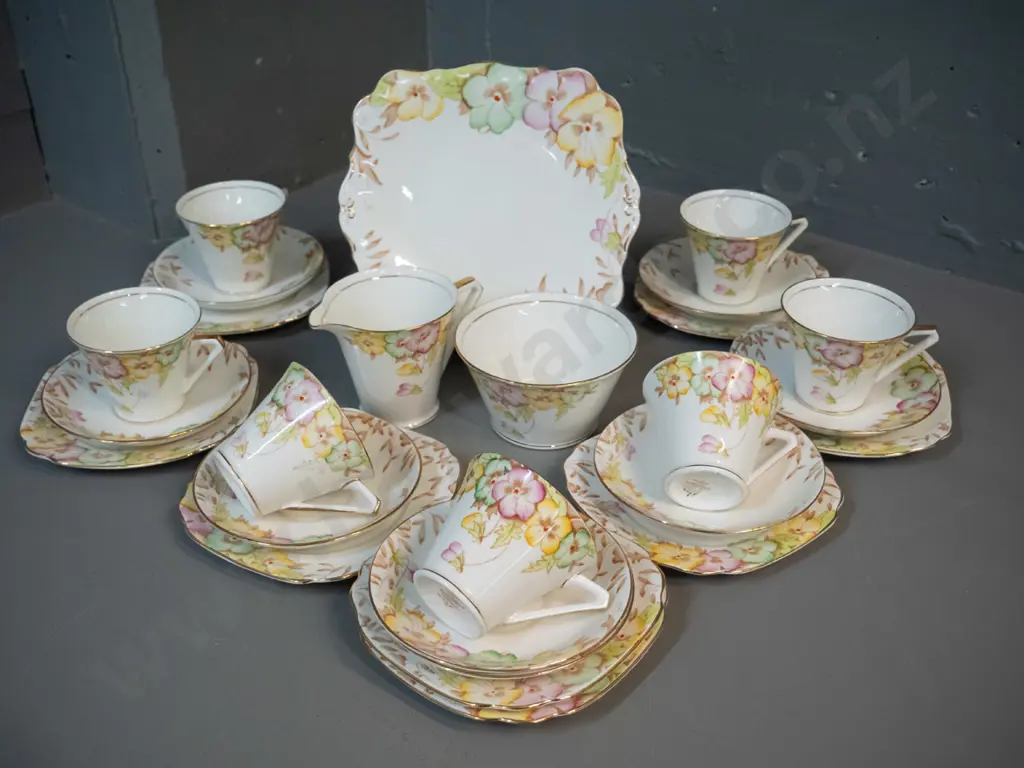 Bell English china tea set - 7 trios, cake plate, cream & sugar, spare saucer and plate Image 1++