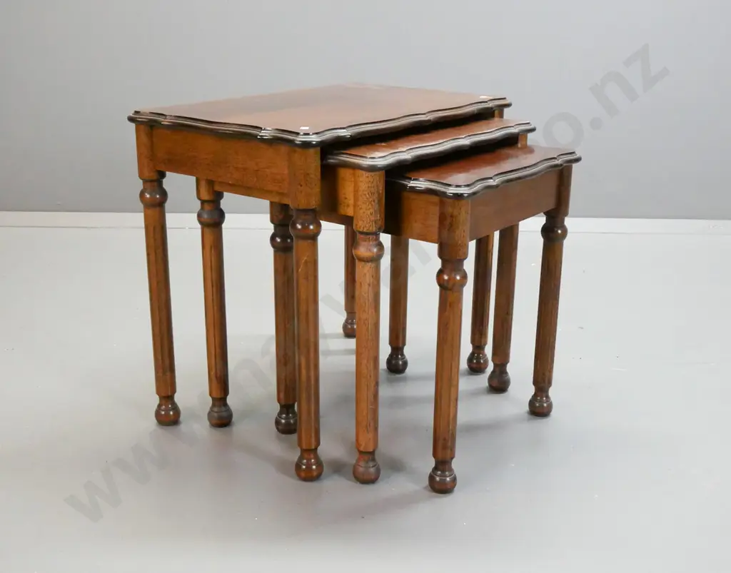 set of 3 reproduction nesting tables with shaped veneered tops on turned fluted legs - middle has staining and marks to Image 1++