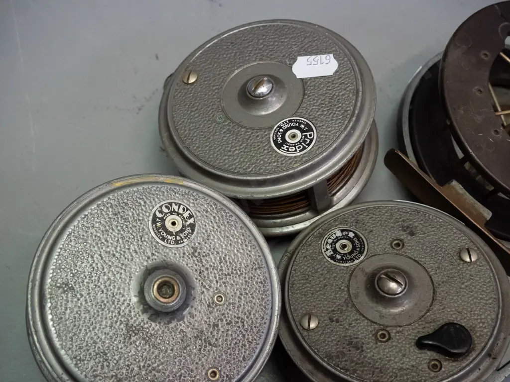 4 metal cased fly fishing reels - JW Young & Sons - 2 marked Pridex, 1 Condex, aerial style bakelite and metal has no Image 1++
