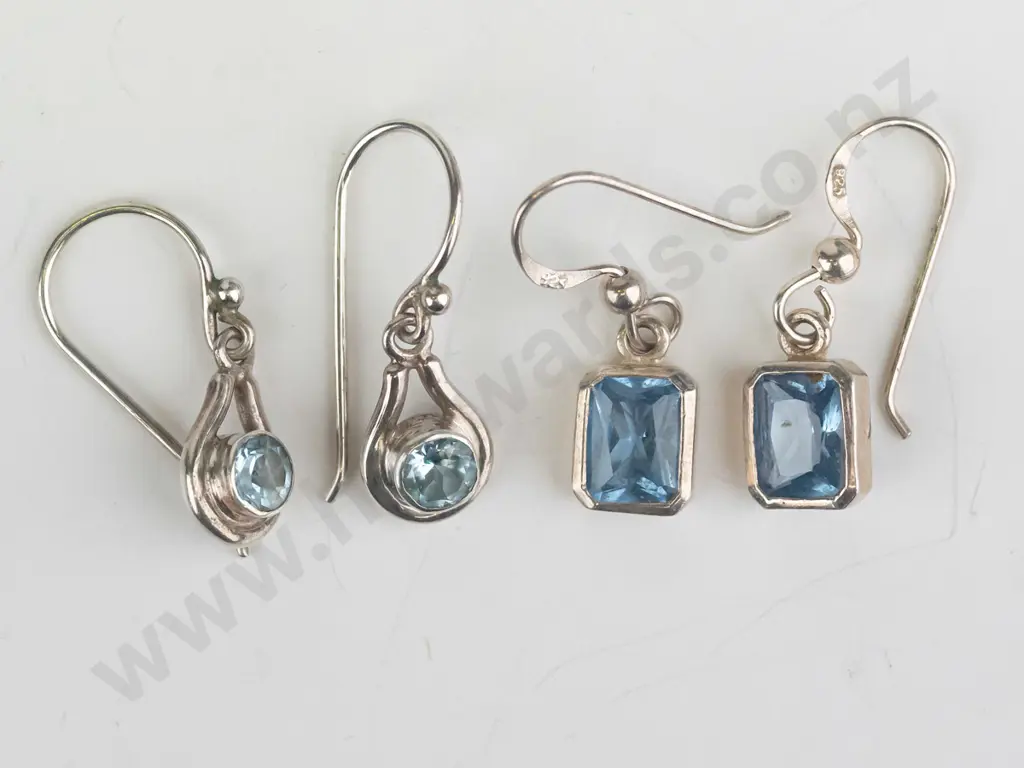 2 pairs silver light blue stone earrings both stamped 925 Image 1++