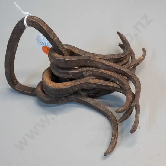 set of wrought iron double-barbed hooks on ring - each hook H100 W130