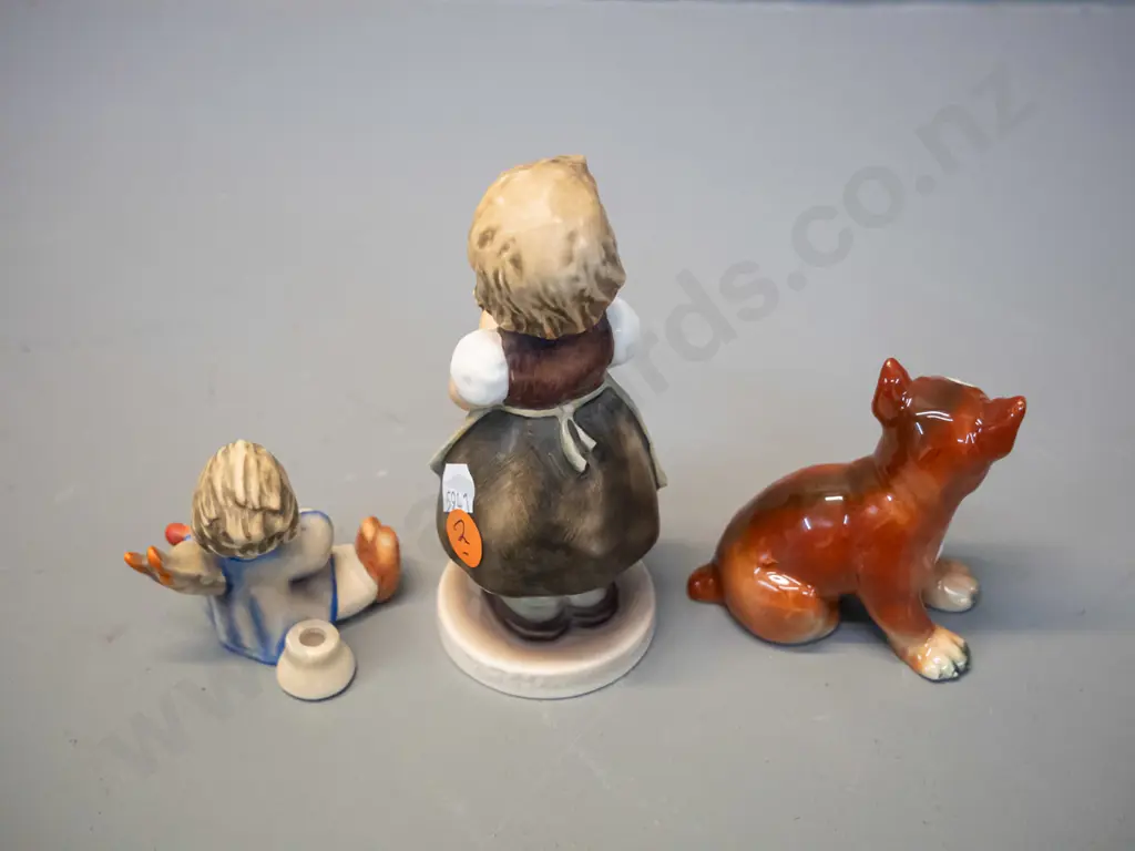 3 Goebels figurines - girl with posie H-130, angel with stringed instrument and high glaze boxer puppy Image 1++