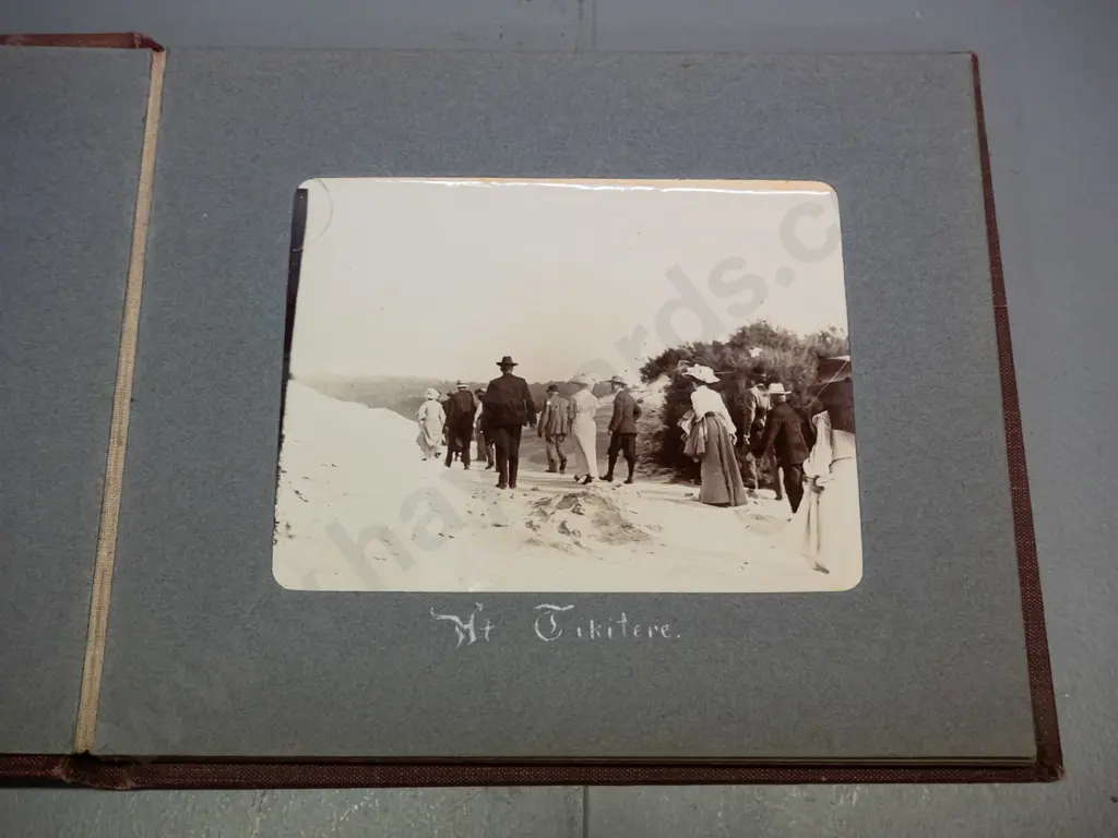 small vintage photograph album with mainly Rotorua tourist subjects, Lake Rotokakha, diving at Whaka Bridge, etc. Image 1++