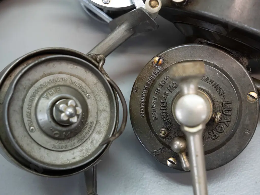 4 metal cased fishing casting reels - Young & Sons Ambidex, Harrington & Sons, Pezon & Michel Luxor France, and Ocean Image 1++