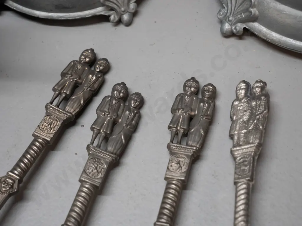 German pewter ware - 4 graduated jugs / coffee pots and 9 soup spoons with figural handles; some wear and marks. Tallest Image 1++
