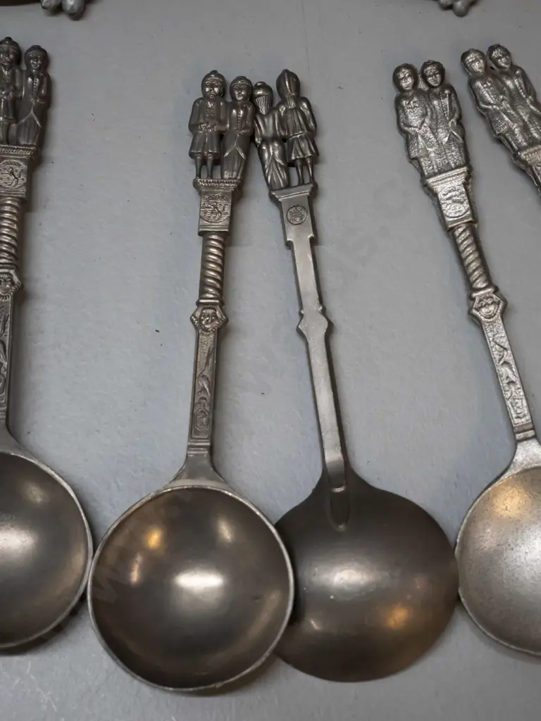 German pewter ware - 4 graduated jugs / coffee pots and 9 soup spoons with figural handles; some wear and marks. Tallest Image 1++